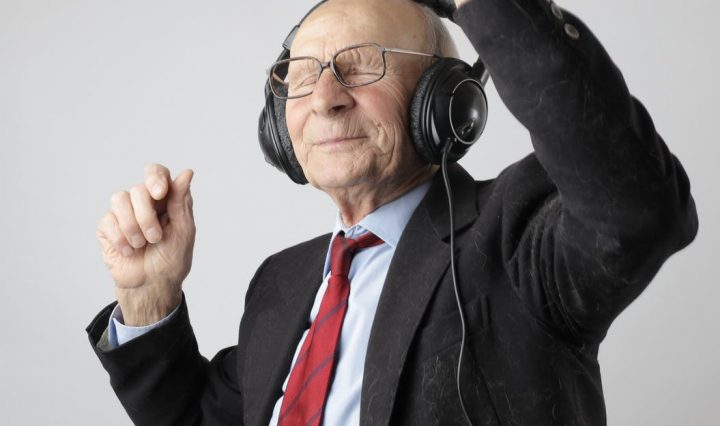 man in black jacket wearing black headphones