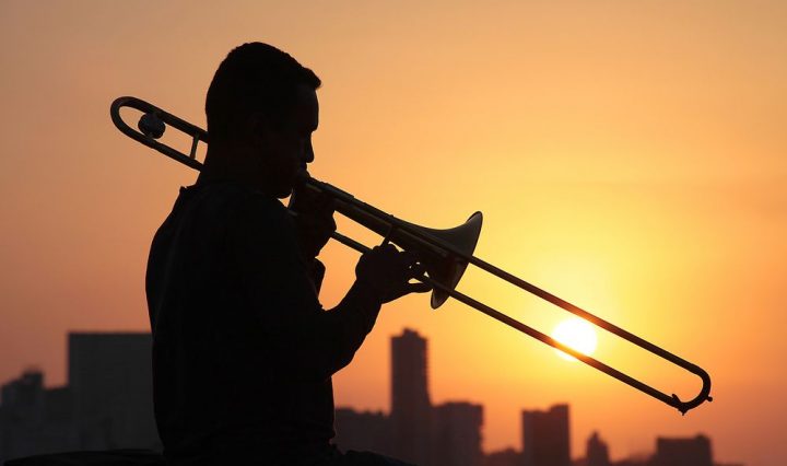 Trombone player in the sunset